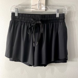Athletic pleated shorts
